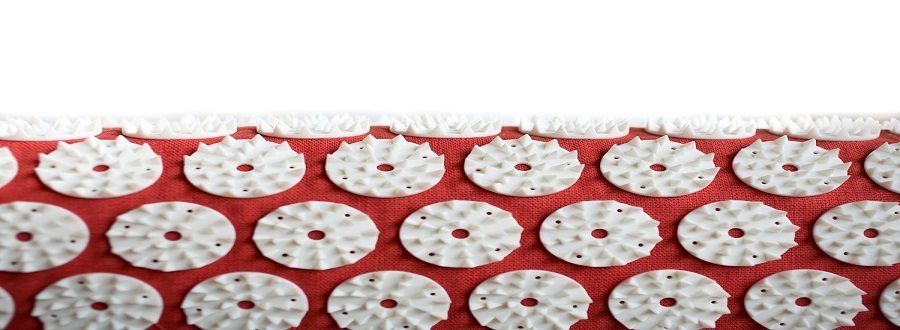 red and white accupressure mat