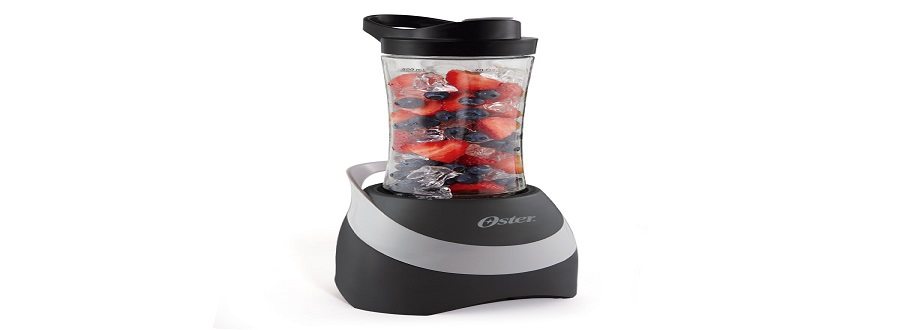 blender with fruit and ice inside