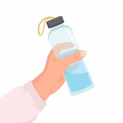 Woman holding a reusable water bottle Woman holding a reusable water bottle
